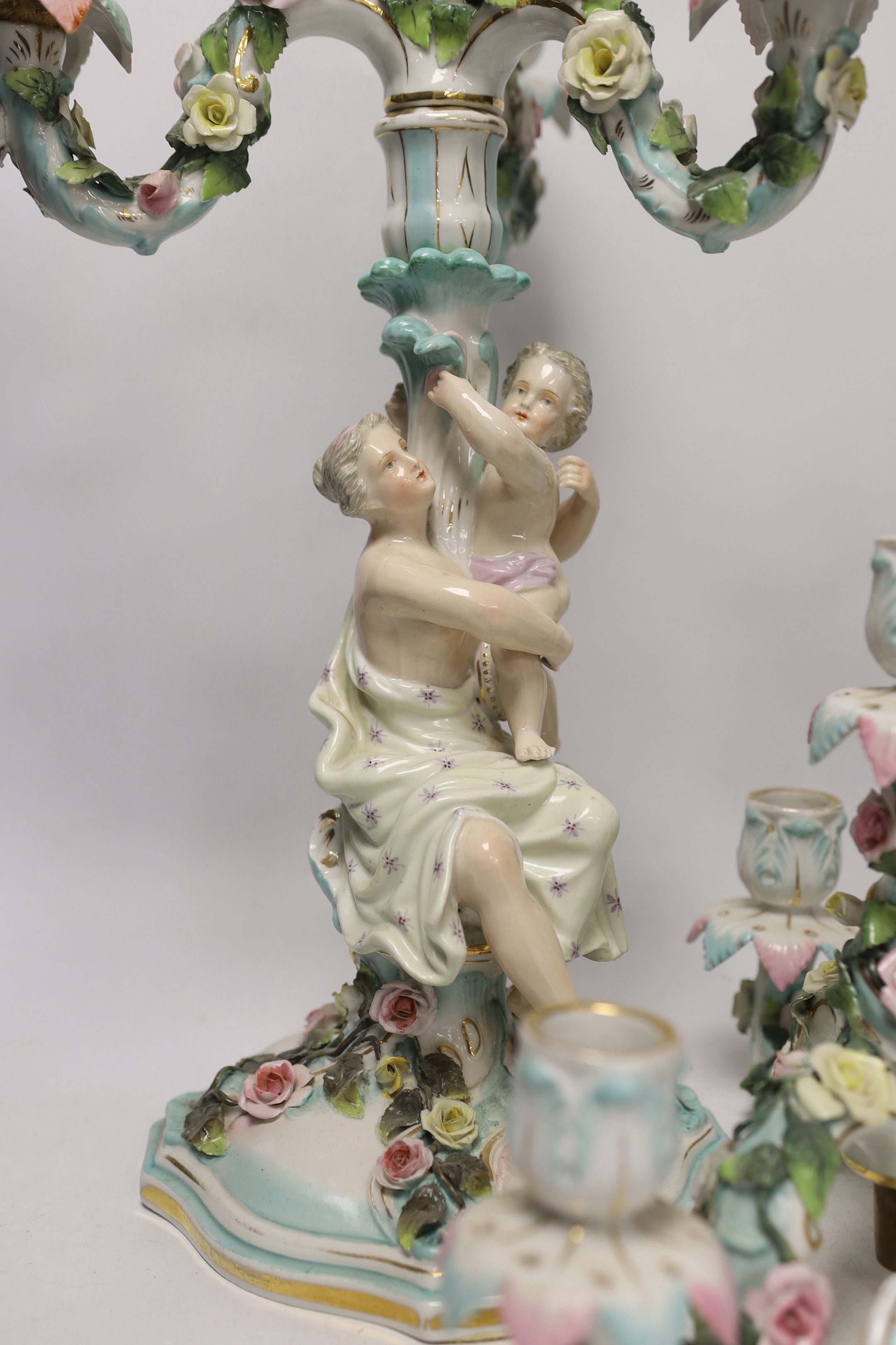 A pair of Sitzendorf figural candelabra, 46cm